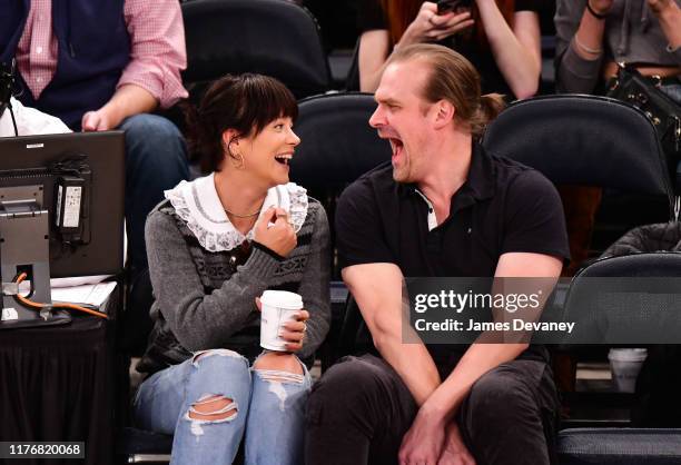 Lily Allen and David Harbour attend New York Knicks v New Orleans Pelicans preseason game at Madison Square Garden on October 18, 2019 in New York...