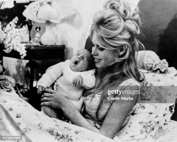 Brigitte bardot with son nicolas jacques. 1960.