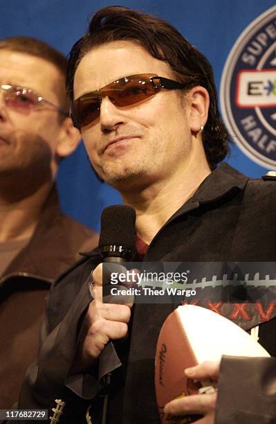 Lead singer Bono of U2 at a press conference January 30, 2002 at the Superdome in New Orleans, Louisiana, days before their live performance during...