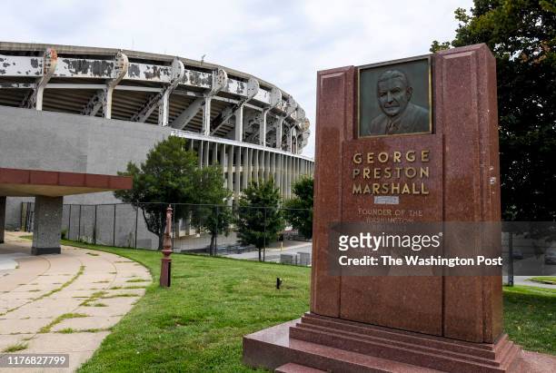 Monument to the founder of the Washington Redskins, George Preston Marshall in from to the stadium. District officials say they will tear down the...