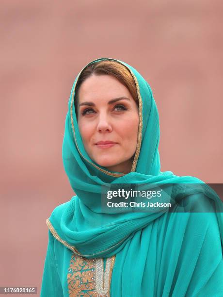 Catherine, Duchess of Cambridge arrives at the Badshahi Mosque within the Walled City during day four of their royal tour of Pakistan on October 17,...