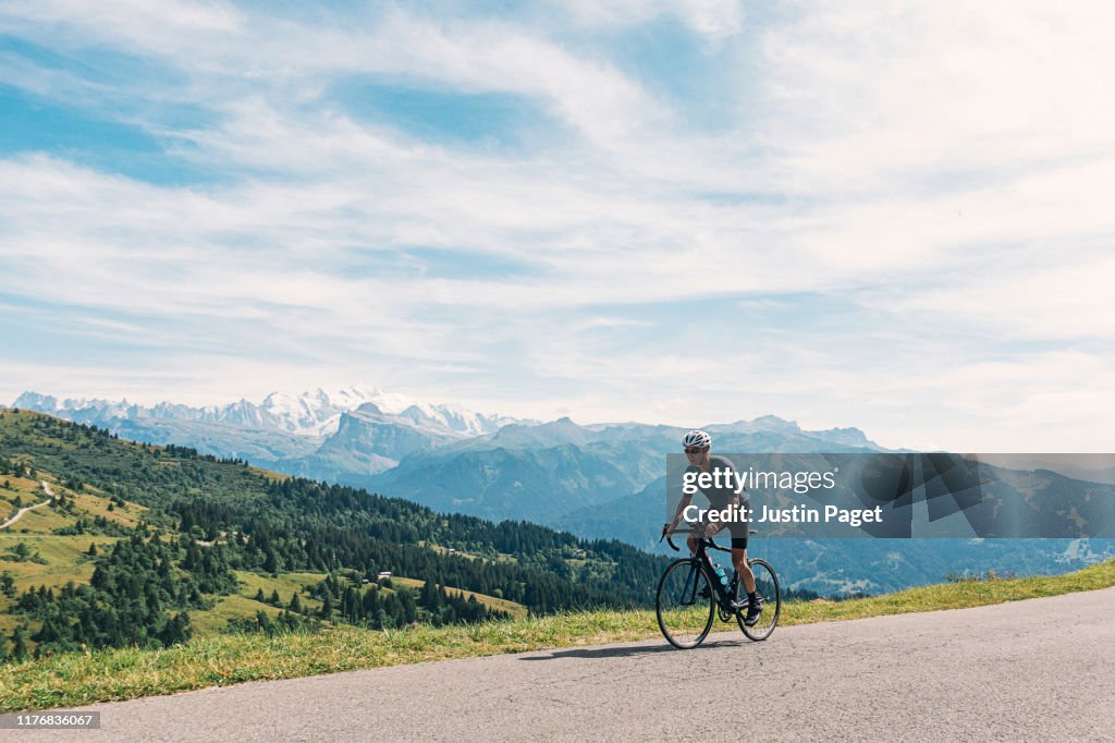Senior Cyclist on the top of the Col de Joux Plane