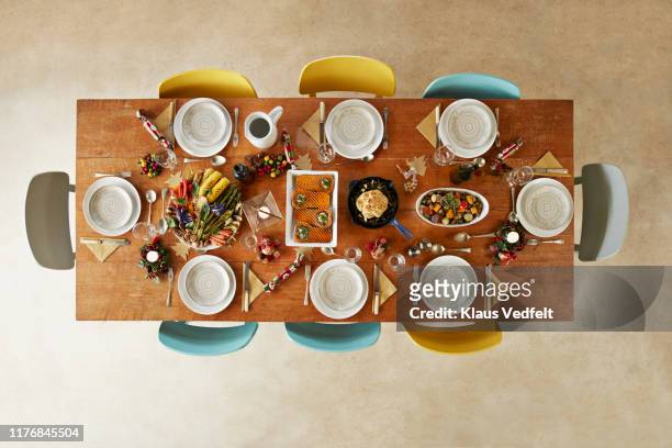 directly above shot of vegan christmas meal on table at home - overhead view stock-fotos und bilder