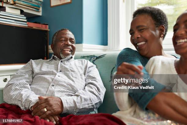 grandparents playing with granddaughter at home - funny grandma stock pictures, royalty-free photos & images