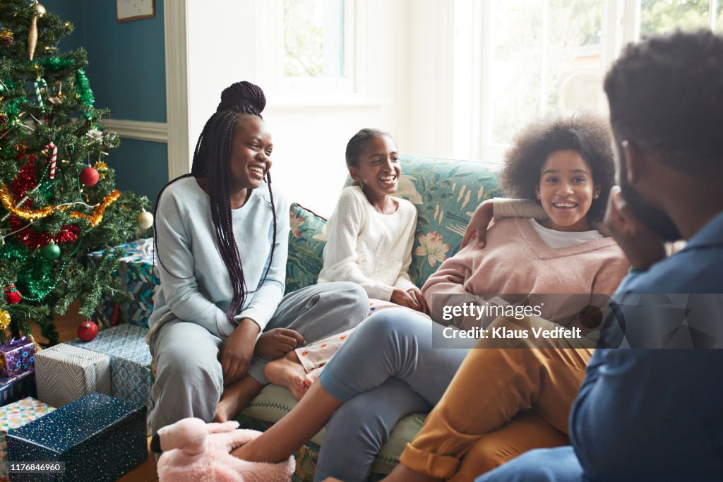 Girls enjoying holidays with young man and woman