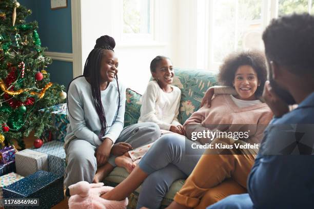 girls enjoying holidays with young man and woman - 14 year old biracial girl curly hair stock pictures, royalty-free photos & images