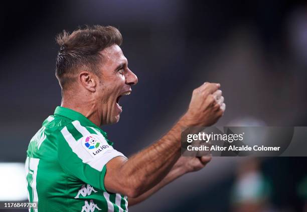 Joaquin Sanchez of Real Betis Balompie celebrates after his teammate Loren Moron scored during the Liga match between Real Betis Balompie and Levante...