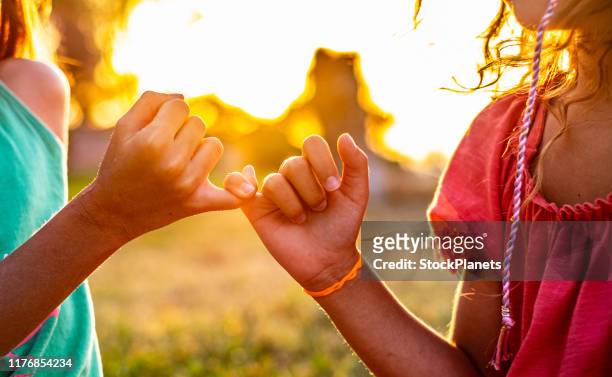 girls reconciliation - apology stock pictures, royalty-free photos & images