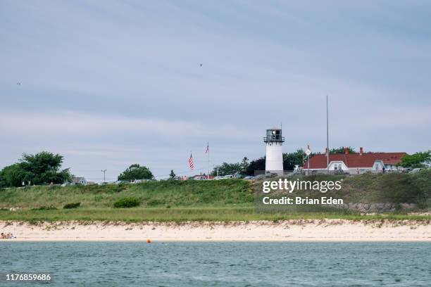 chatham lighthouse and lighthouse beach in cape cod, massachusetts - chatham massachusetts stock pictures, royalty-free photos & images