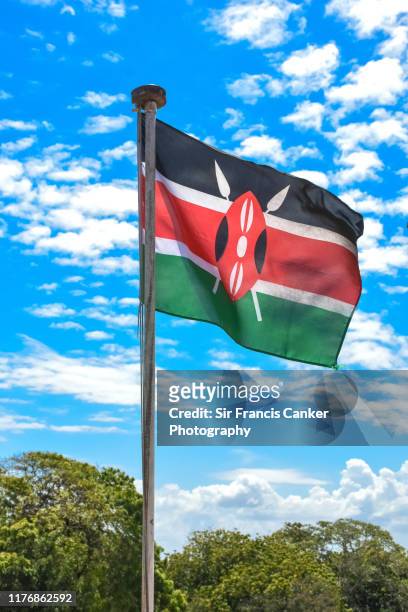 kenya flag waiving in nairobi - kenyan flag stock pictures, royalty-free photos & images