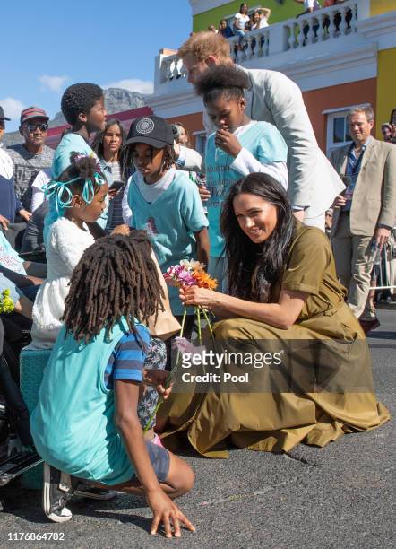 Prince Harry, Duke of Sussex and Meghan, Duchess of Sussex attend Heritage Day public holiday celebrations in the Bo Kaap district of Cape Town,...