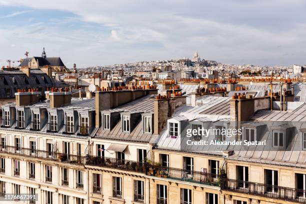 paris skyline with residential houses rooftops high angle view, paris, france - paris france stock-fotos und bilder