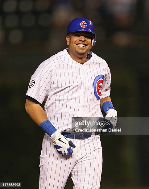 Aramis Ramirez of the Chicago Cubs smiles after getting the game-winning hit as a pinch-hitter in the bottom of the 9th inning against the San...