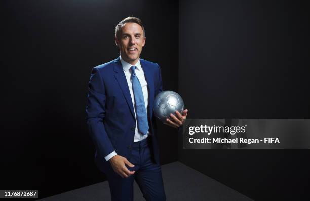 The Best FIFA Women’s Coach 2019 award finalist Phil Neville of England poses for a portrait in the photo booth prior to The Best FIFA Football...