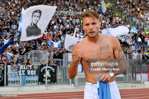 Ciro Immobile of SS Lazio celebrates after scoring the third goal of his team via penalty during the Serie A match between SS Lazio and Atalanta BC...