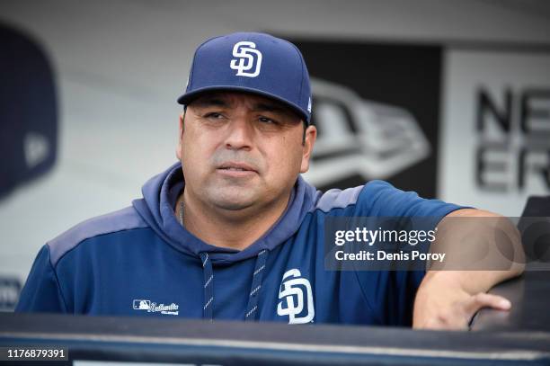 Interim manager Rod Barajas of the San Diego Padres looks on from the dugout before a baseball game against the Arizona Diamondbacks at Petco Park...