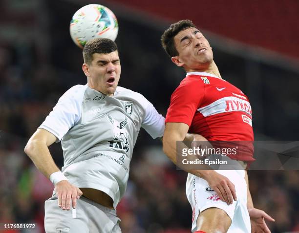 Ezequiel Ponce of FC Spartak Moscow and Igor Konovalov of FC Rubin Kazan vie for the ball during the Russian Premier League match between FC Spartak...