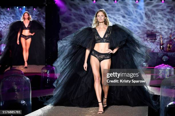 Constance Jablonski walks the runway during the Etam Winter 2019/Summer 2020 show as part of Paris Fashion Week At Roland Garros on September 24,...