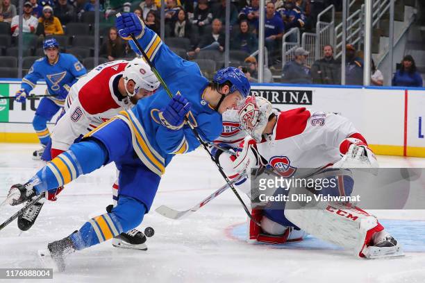 Carey Price of the Montreal Canadiens makes a save against Sammy Blais of the St. Louis Blues at Enterprise Center on October 19, 2019 in St Louis,...