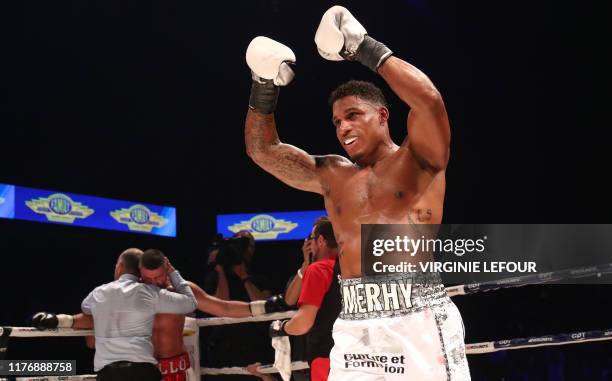 Belgian Ryad Merhy celebrates after winning a boxing fight between Belgian Ryad Merhy and Hungarian Imre Szello, the interim World Boxing Association...