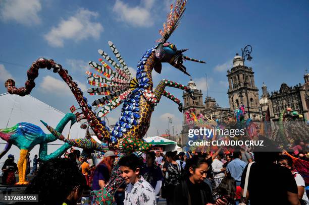 View of "Alebrijes" -Mexican folk art sculptures representing fantastical creatures- during the 13th "Alebrijes" Parade and contest organized by the...