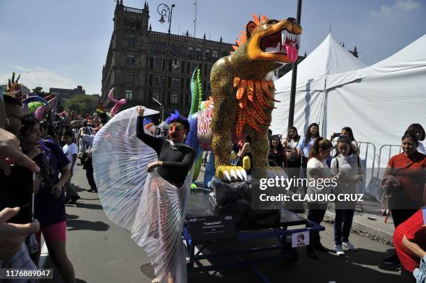 View of "Alebrijes" -Mexican folk art sculptures representing fantastical creatures- during the 13th "Alebrijes" Parade and contest organized by the...