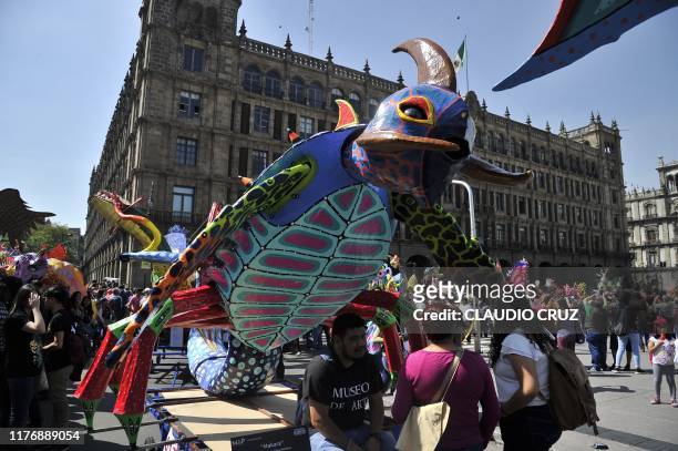 View of "Alebrijes" -Mexican folk art sculptures representing fantastical creatures- during the 13th "Alebrijes" Parade and contest organized by the...