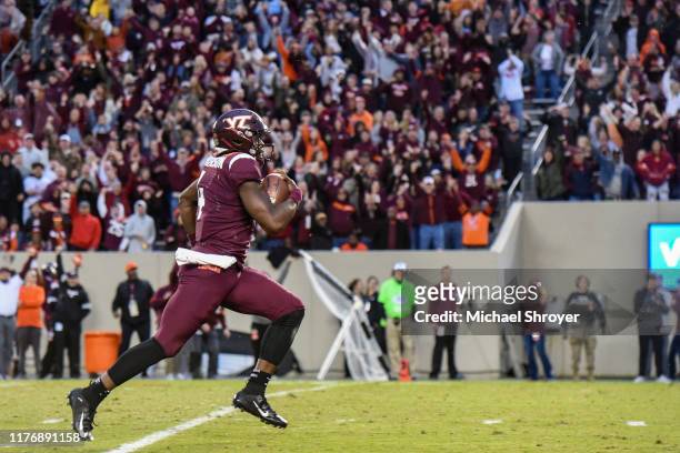 Quarterback Quincy Patterson II of the Virginia Tech Hokies rushes during a long touchdown run against the North Carolina Tar Heels in the second...