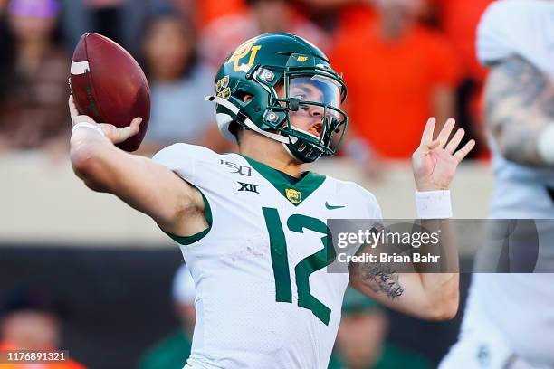 Quarterback Charlie Brewer of the Baylor University Bears throws against of the Oklahoma State Cowboys in the fourth quarter on October 19, 2019 at...