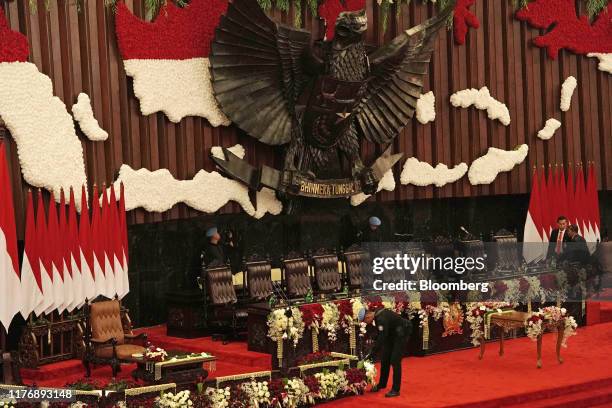 Members of the Presidential Security Force of Indonesia conduct security checks ahead of the presidential inauguration at the parliament in Jakarta,...