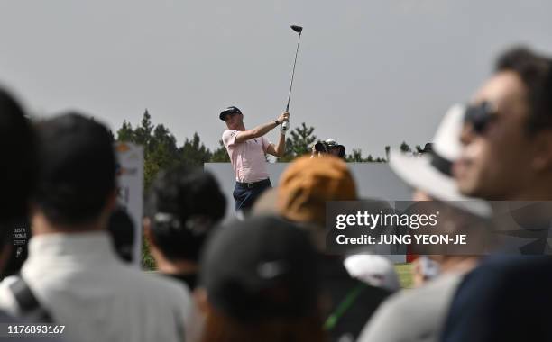 Justin Thomas of the US hits his tee shot on the 9th hole during the final round of the CJ Cup golf tournament at Nine Bridges golf club in Jeju...