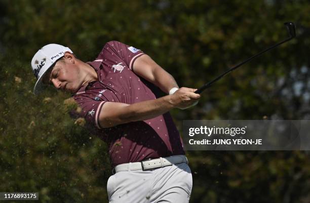 Cameron Smith of Australia hits his tee shot on the 4th hole during the final round of the CJ Cup golf tournament at Nine Bridges golf club in Jeju...