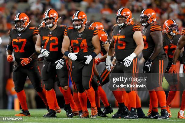 Justin McCray of the Cleveland Browns, Eric Kush, JC Tretter, Joel Bitonio, and Greg Robinson line up for a play during the game against the Los...