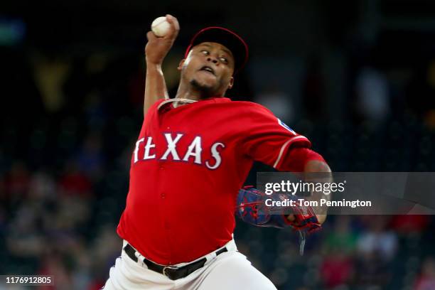 Edinson Volquez of the Texas Rangers pitches against the Boston Red Sox in the top of the first inning at Globe Life Park in Arlington on September...