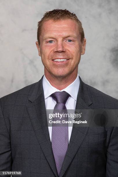Kris Draper of the Detroit Red Wings poses for his official headshot for the 2019-2020 season at Little Caesars Arena on September 17, 2019 in...