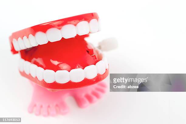 chattering teeth - wind up toy stock pictures, royalty-free photos & images
