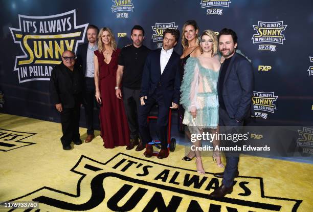 Danny DeVito, David Hornsby, Kaitlin Olson, Rob McElhenney, a mannequin of Glenn Howerton, Jill Latiano, Mary Elizabeth Ellis and Charlie Day arrive...