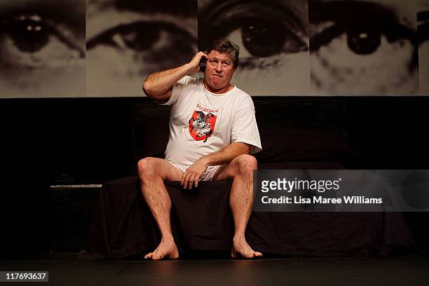 Actor Peter Phelps performs a scene from "Stainless Steel Rat" a story about Julian Assange at the York Theatre on June 30, 2011 in Sydney,...