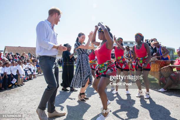 Meghan, Duchess of Sussex visits the Nyanga Township with Prince Harry, Duke of Sussex during their royal tour of South Africa on September 23, 2019...