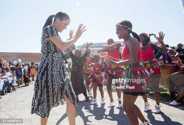 Meghan, Duchess of Sussex visits the Nyanga Township with Prince Harry, Duke of Sussex during their royal tour of South Africa on September 23, 2019...