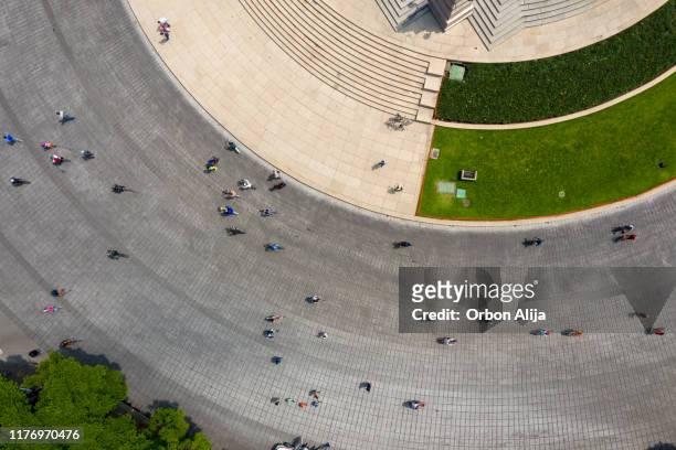people cycling in the street. mexico city - people walking overhead view stock pictures, royalty-free photos & images