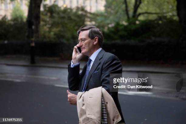 Former Tory MP Dominic Grieve waits for a taxi outside the Houses of Parliament on September 25, 2019 in London, England. Yesterday the Supreme Court...