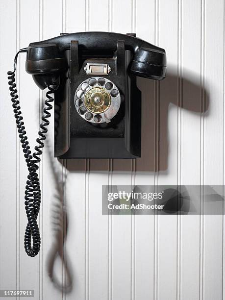 Phone Hangs On A Wall Stock Photo, Picture and Royalty Free Image