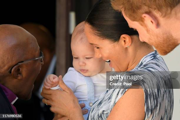 Prince Harry, Duke of Sussex, Meghan, Duchess of Sussex and their baby son Archie Mountbatten-Windsor meet Archbishop Desmond Tutu at the Desmond &...
