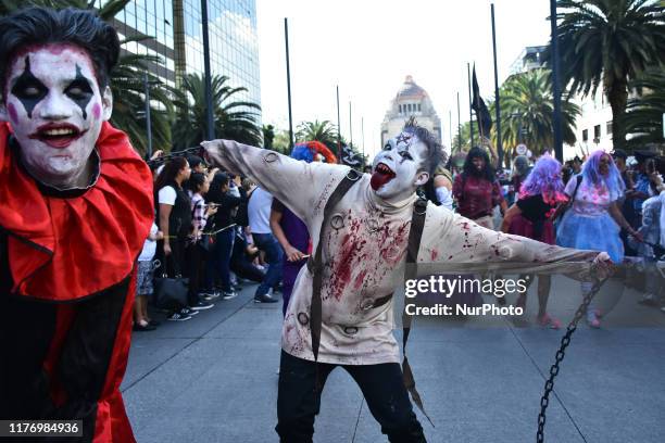 Participant is seen taking part during the march of annual Zombie Walk at Monumento of Revolucion on October 19, 2019 in Mexico City, Mexico