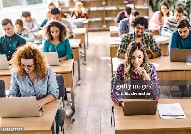 e-learning over computers in the classroom! - freshman class 2018 stock pictures, royalty-free photos & images