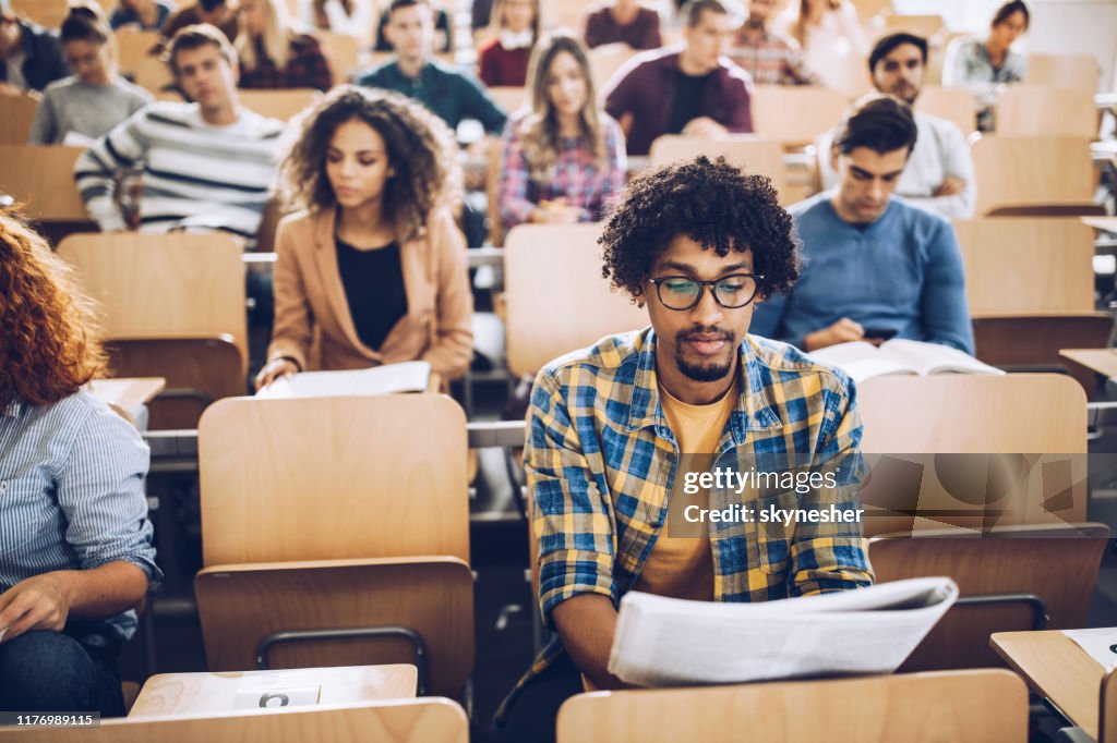 College First Class College Students Studying In Class