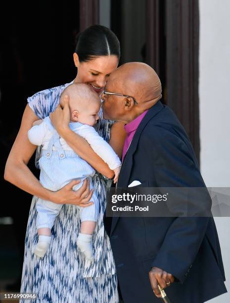 Prince Harry, Duke of Sussex, Meghan, Duchess of Sussex and their baby son Archie Mountbatten-Windsor meet Archbishop Desmond Tutu and his daughter...