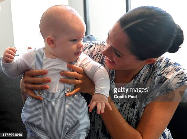 Meghan, Duchess of Sussex holds her baby son Archie Mountbatten-Windsor at a meeting with Archbishop Desmond Tutu at the Desmond & Leah Tutu Legacy...