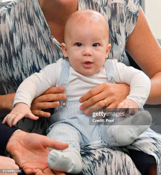 Prince Harry, Duke of Sussex, Meghan, Duchess of Sussex and their baby son Archie Mountbatten-Windsor meet Archbishop Desmond Tutu and his daughter...